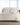 St. Pierre bedding set featuring a subtle stripe pattern in a soft neutral tone, styled on a modern bed with matching pillowcases and a sleek bedside setup.